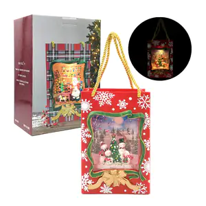 Adorno navideño musical en forma de bolsa de regalo 24cm con luz y fi…